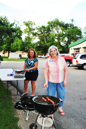Hot dogs were grilled by MHSAA Events Committee co-chairs Gail Eyestone and Becky Mosier.