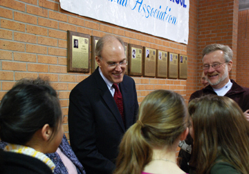 Bill Buzenburg '64 chats with MHS students in front of Wall of Fame at MHS West. The award winning journalist was in Manhattan for his induction into the MHSAA Wall of Fame. The complete story may be found in the Spring 2008 Alumni Mentor.