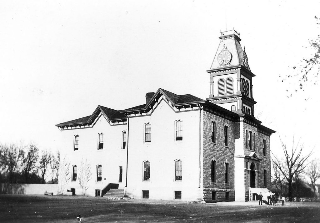 Central School 1878 Ivy would later cover the walls, the clock tower would come down, and East and West Wings would be added. Photo courtesy of The Riley County HIstorical Society.