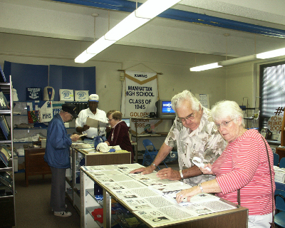 Wall of Fame biographies were of interest to these 1944 reunion attendees.