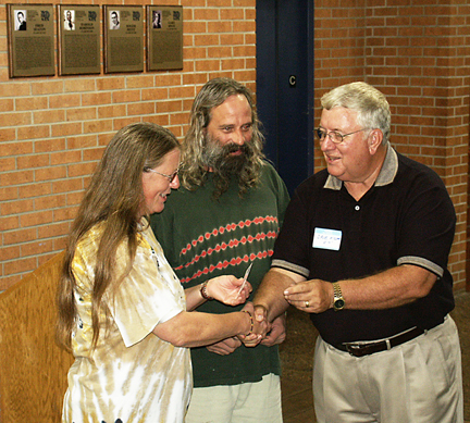 President Dave Fiser presents Rick Weisbender and Pat Barry, restorers of the Indian Mosaic, with Life Memberships during the Wall of Fame dedication.
