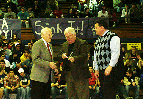 Tom Romig receives his Wall of Fame award, after which he spoke to the MHS students.