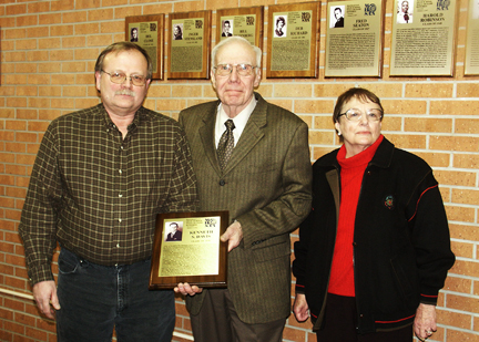 Ed Albrandt, Ralph and Mary Ellen Titus with the Davis Wall of Fame plaque.